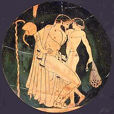 Escena pederàstica a la palestra: home adult i jove a punt de fer l'amor. El jove porta una bossa de fruits secs, probablement un regal de cortesia del seu amant. Tondo d'una copa àtica de figures vermelles (480-470 aC)