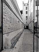 View of the passage towards the street, original gate of the Leprince estate, in Louis XVI style.