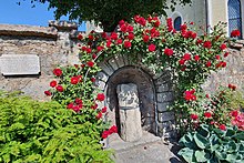 Römischer Meilenstein in der Friedhofsmauer der Pfarrkirche Puch