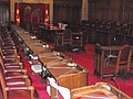 Senators occupy benches facing each other in the Senate Chamber