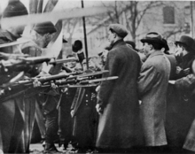 Bread and Roses Strike. Massachusetts National Guard troops surround unarmed strikers in Lawrence, Massachusetts, 1912. Standoff between militia and strikers, Lawrence, Mass.png