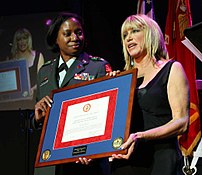 July 12, 2005:  Somers is given an award for 