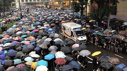 Protesters making way for ambulance