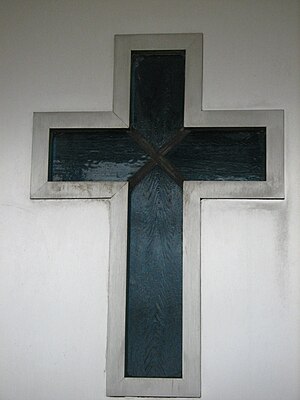 Cross-shaped window inside church in Hicksvill...