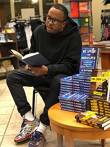 Watkins doing a live reading in Baltimore in October 2019 D. Watkins reading.jpg