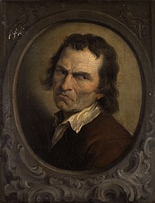 Portrait d'un homme au regard sombre, rempli de haine.