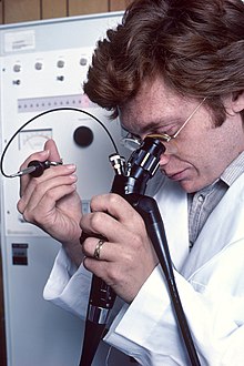 Photograph of doctor/internist performing a colonoscopy