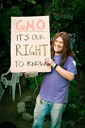 A protester advocating for the labeling of GMOs GMO Full Disclosure Advocate.jpg
