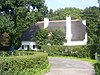 Klaverblad, boerderij met tuin en hekje