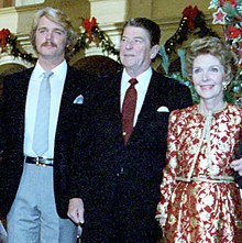 Actor John Schneider poses with President Ronald Reagan and First Lady Nancy Reagan during a taping of the NBC TV special Christmas in Washington on December 12, 1982 at the Pension Building in Washington, D.C.