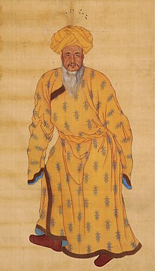 Uyghur General Khojis (-1781), governor of Us-Turfan, who later resided at the Qing court in Beijing. Painting by a European Jesuit artist at the Chinese court in 1775. Khojis full-length portrait.jpg