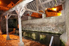 Lavoir, de nuit.