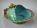 Chestnut server, 1865, 11 ins., coloured glazes, naturalistic in style.