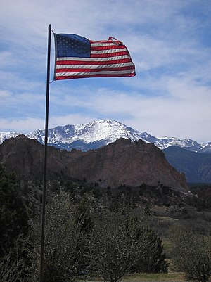 U.S. Flag, Pikes Peak, and the Garden of the G...