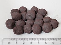 Pelletized iron ore with scale.jpg