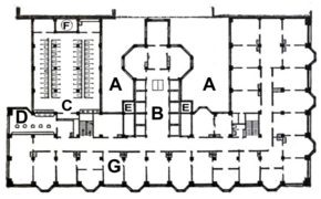 Plan d'un étage avec les bureaux regroupés le long des façades en bas et à droite. Un atrium entourant le hall se trouve au centre et les toilettes forment une grande salle à gauche.