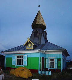 The Temple of the Wisdom of Perun, part of the headquarters of the Ynglist Church in Omsk, in 2004. Temple of the Wisdom of Perun in Omsk, 2004.jpg