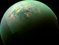 Image 83A view beneath the clouds of Titan, as seen in false colour, created from a mosaic of images taken by Cassini (2013) (from Space exploration)
