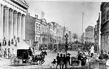 View of Wall Street from corner of Broad Street, 1867. On the left is the sub-Treasury building, now the Federal Hall National Memorial. Wall street 1867.jpg