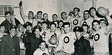 Photograph of the RCAF Hurricanes team celebrating their 1942 Grey Cup Win