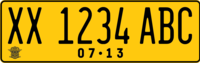 Former (until June 2022) design of Indonesian registration plates for private vehicles. The Indonesian Police Traffic Corps logo can be seen on the lower left. The plates are still valid during a five-year transition period.