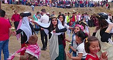 Yazidis celebrating a Yazidi ceremony called Tawwaf in the town of Bashiqa in Iraq. A Yazidi ceremony called Tawwaf in the town of Baashiqa in Iraq.jpg