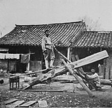 The Far East used a different method of sawing logs than the West's method of pit-sawing with a saw pit: The concept is the same but as shown here the log is angled and no pit is used. CHINESE SAWYERS.jpg