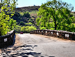 This bridge across the Blyde River is situated about three kilometres from Pilgrim’s Rest on the road to Lydenburg and the Blyde River Poort. The bridge was built under Act No. 201, passed by the Executive Council on 11 March 1896. The contractor was G Type of site: Bridge.