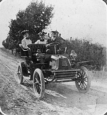 Orville Wright (driving), Katharine Wright (center), and family friend Harriet Silliman in the "St. Louis" automobile purchased by Charles Webbert through the Wright Cycle Company in 1903