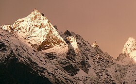 Kinnaur Kailash with Monolithic pillar a 79 feet vertical rock formation that resembles a Shivalinga.jpg