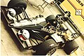 Lotus 95T in the garages of the 1984 Detroit Grand Prix