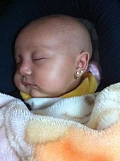 Newborn baby girl with triple ear piercings - Costa Rica 2012. Multiple ears pierced baby.jpg