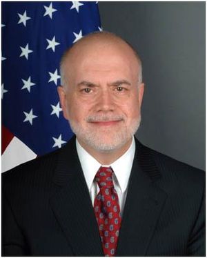English: Scott H. DeLisi, U.S. diplomat. As of...