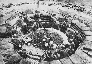 A Chinese machine gun nest in Shanghai. Note the German M35 used by the NRA soldiers.