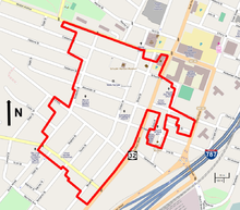 A street map of south central Albany showing the district boundary as a red line