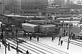 Een NS 2200 met goederentrein heeft op de kruising Maashaven Oostzijde-Putselaan een vrachtwagen geramd, 1963