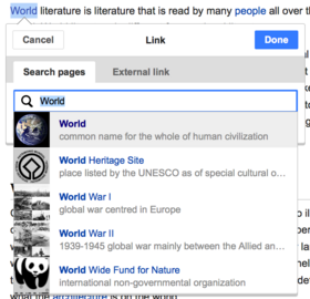 Visual Editor and it's source mode has a Link insertion panel featuring Wikidata descriptions