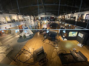 Exhibition hall displaying local history displays and objects Winona County History Center-Armory-05.jpg