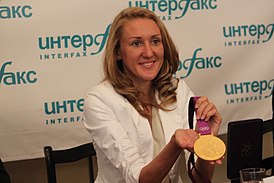 С олимпийской медалью 2012 г.