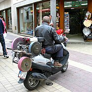 Scissors grinder with converted scooter in Tossa de Mar, 2009