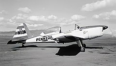 Grayscale photo of a monoplane