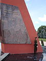 A member of the company standing guard at the memorial complex.
