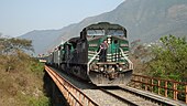 A freight train with freight hoppers in Mexico FERROSUR 4400 NORTE.jpg