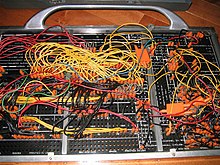 IBM 402 accounting machine control panel wiring. This board was labeled "profit & loss summary." IBM402plugboard.Shrigley.wireside.jpg