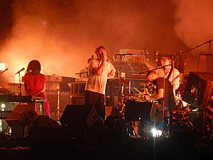 The band performing on stage