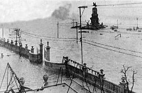 La Casa de Beneficencia y Maternidad during the hurricane of 1919 and the Antonio Maceo monument.