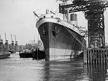 8,510 GRT cargo ship Menestheus in King George V Dock, London in about 1960 MV 'Menestheus' in King George V Dock.jpg