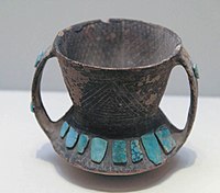 Pottery jar inlaid with turquoise, Siba Culture, Gansu.