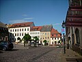 Wohnhaus (mit Gaststätte) in geschlossener Bebauung in Ecklage (Gasthaus Zum Rössl)