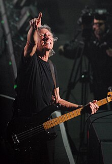 Roger Waters playing bass guitar